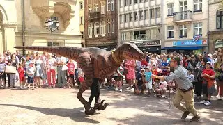 Dino show with big dinosaur costume