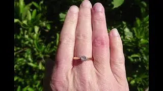 A 18ct gold half carat diamond solitaire engagement ring