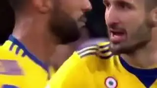 Chiellini showing the money gesture to referee