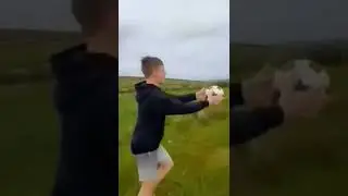 Hitting soccer ball into wind turbine