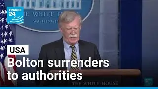 Trump adviser Bolton surrenders to authorities on charges in classified information case