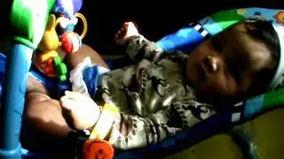 Rafif on the baby bouncer