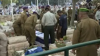 Israel buries hostage officer killed in Gaza 11 years ago | AFP