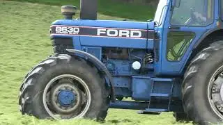 FORD 8630 AND POTTINGER HIT50NZ SPREADING GRASS