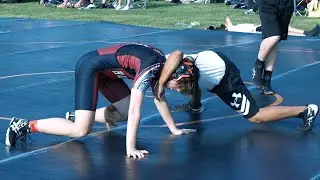 Dallas Kohlmann of New Holstein HS [R] v. Daniel King of Menominee Indian HS [G] (150)