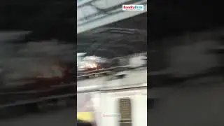 The pantograph of a local train at Bandra Railway Station catches fire