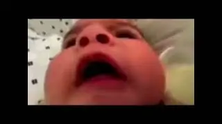 Baby screaming at camera