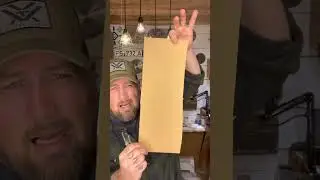 Box cutter knife tips on cardboard