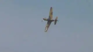 aviation  Curtiss wright warhawk P40F GCGZP plane etc displaying at  Duxford flying legends air show