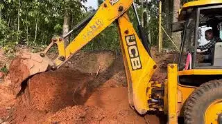 Jcb 3dx digging sides and gathering soil
