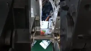 Tea bag packing machine with the string and tag