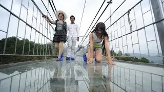 China Opens Scary Glass Bridge