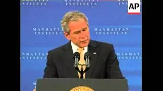 President George W. Bush defends free markets in a speech in Manhattan, saying the answer to current
