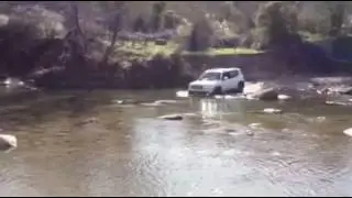 jeep renegade 4x4 crossing a river