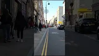 Cycling up the famous Brick Lane in East London