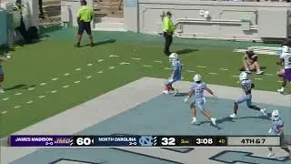 North Carolina's Caleb LaVallee blocks a punt and Davion Gause returns it for a TD vs. James Madison