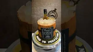Whiskey themed cake with real whiskey bottle cake design by MasterBaker Oindrila Bala | unique cake