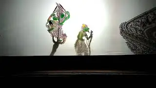 Wayang Kulit:  Scene Dewa Panah (female dalang in-training)