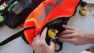 Remplacement d'un cartouche dans un gilet gonflable automatique avec un système Hammar