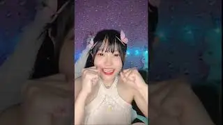 Very cute Myanmar girl streams live wearing a white tank top and she ties up her hair 