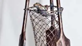 Functional sculpture of forged iron, hanger Old Oars and the Frog
