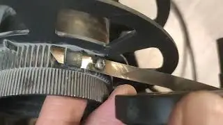 How to attach the spring to the cord reel of a Hyundai H-VCB51 vacuum cleaner