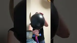 Helium balloons black with gold. Big black balloon. Balloons decoration. Inflate helium balloons