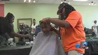 Local hair salon gives out nearly 100 free haircuts for students going back to school