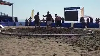Pakistani wrestler Inam Butt reaches into Final
