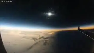 Solar eclipse view  from above the clouds