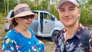 I'M SHOWING MAMA OLGA WHERE WE'RE GOING TO BUILD A HOUSE! She is so happy!