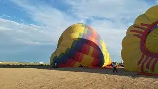 July 2017 trying to stabilize balloons for launch on a windy day