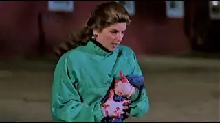 Kirstie Alley in latex gloves