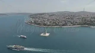 D-Log M. Istanbul, Turkey. Maiden Tower Kiz Kulesi on Bosphorus islet with water taxis and ferrie...