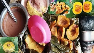 African mum cooking pumpkin, bananas and ground nuts/peanuts in her ghetto kitchen.