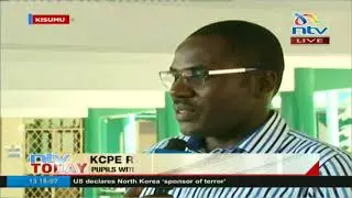 Students arrive in school for their KCPE results