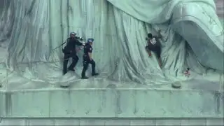 Protest Climber Removed From Statue of Liberty