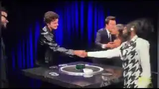 Nic kissing Olandria's hand after Jimmy Fallon