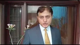 Mr. Dinesh Sudan, LIC Advisor explaining benefits of life insurance and savings. contact him on