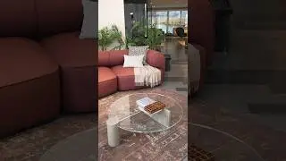 Natuzzi Italia welcomes its muse with an invitation by soft and sinuous lines