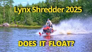 Snowmobiles over the lake