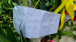 Christopher, la pietà popolare tra fiori e messaggi