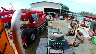 UNLOADING KATO SR700L FROM A VOLVO FMX 440 LOW LOADER AT PENGERANG