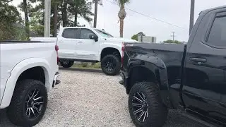 Lift Trucks! American Luxury Coach and Rocky Ridge Silverados