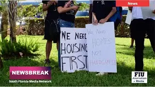 People protest at Miami City Hall against Virginia Key homeless plan