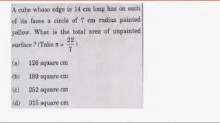 A cube whose edge is 14 cm long has on each of its faces a circle of 7 cm radius painted yellow.