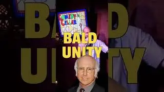 Bald dudes share a moment at comedy show