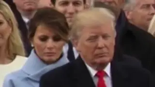 Melania Trump's smile turns into sad frown when Donald turns his back during Inauguration