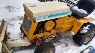 Cub cadet 124 plowing 4 inches of thick snow