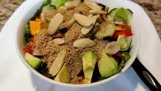 Salad with Fresh grind flaxseeds and pili nuts # Short